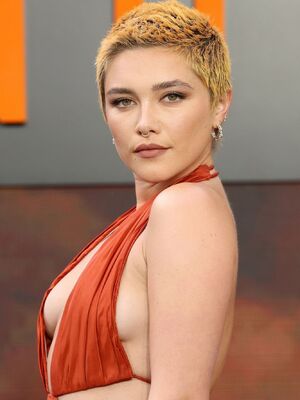 Florence Pugh sideboob at the Oppenheimer premiere in London